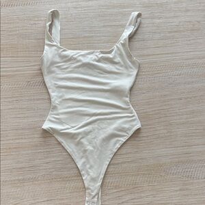 Naked Wardrobe Cream Bodysuit